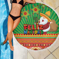 Green round beach blanket with tassel fringe, Feliz Navidad pattern with Santa and cactus