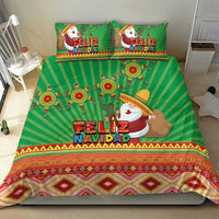 Green Feliz Navidad bedding set with Santa graphic, cactus motifs, and geometric trim