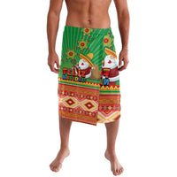 Green Feliz Navidad patterned shorts with Aztec-style border and Santa print