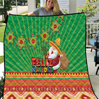 Green Feliz Navidad quilt with aztec geometric border and Santa figure
