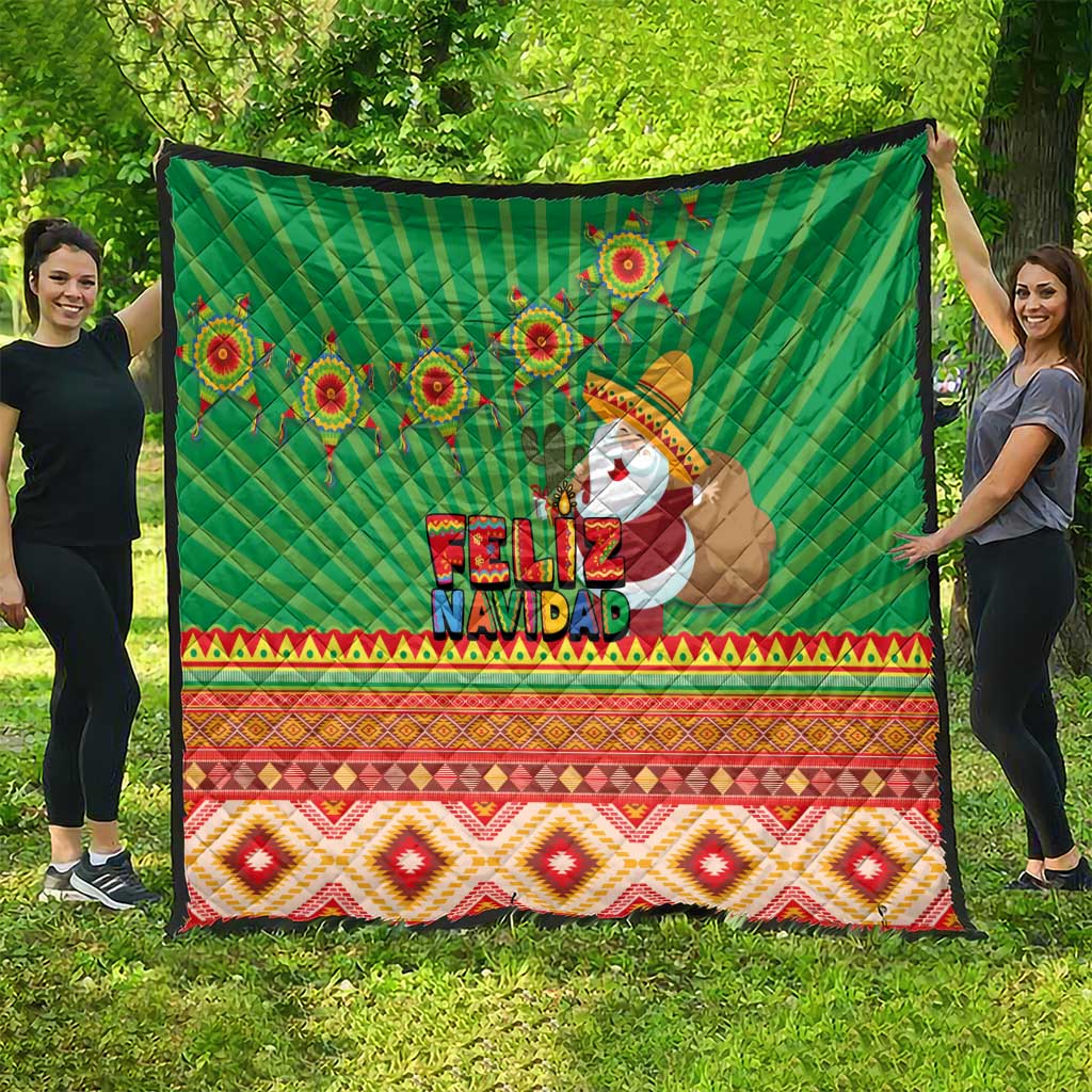 Green Feliz Navidad quilt fully spread, with aztec pattern border and Santa artwork