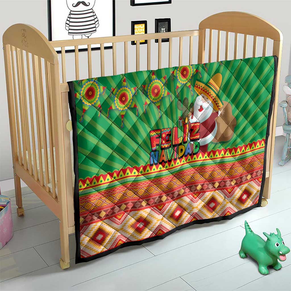 Green Feliz Navidad quilt on a baby crib, with aztec border and Santa figure