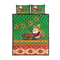 Green quilt bed set with 'Feliz Navidad' Santa artwork, Aztec geometric trim, and 2 pillows