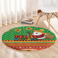 Green round area rug with Feliz Navidad lettering, Santa and reindeer illustration, Aztec trim