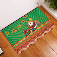 Green rectangular doormat with Feliz Navidad print, Santa and camel, striped Aztec edge
