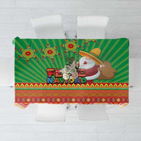 Green tablecloth with Feliz Navidad text and Aztec geometric accents, multicolor border