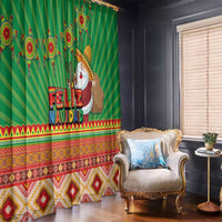 Green “Feliz Navidad” window curtains with striped pattern and colorful Aztec-style border.