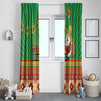 Green Aztec window curtains with striped design and colorful “FELIZ NAVIDAD” graphic.
