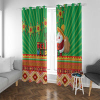 Green striped window curtains with “FELIZ NAVIDAD” print and red-yellow Aztec trim hem.