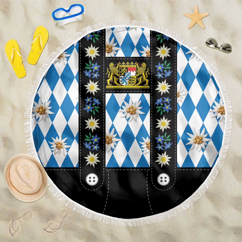 Round blue-and-white diamond Bavarian beach blanket with gold emblem, edelweiss, fringe