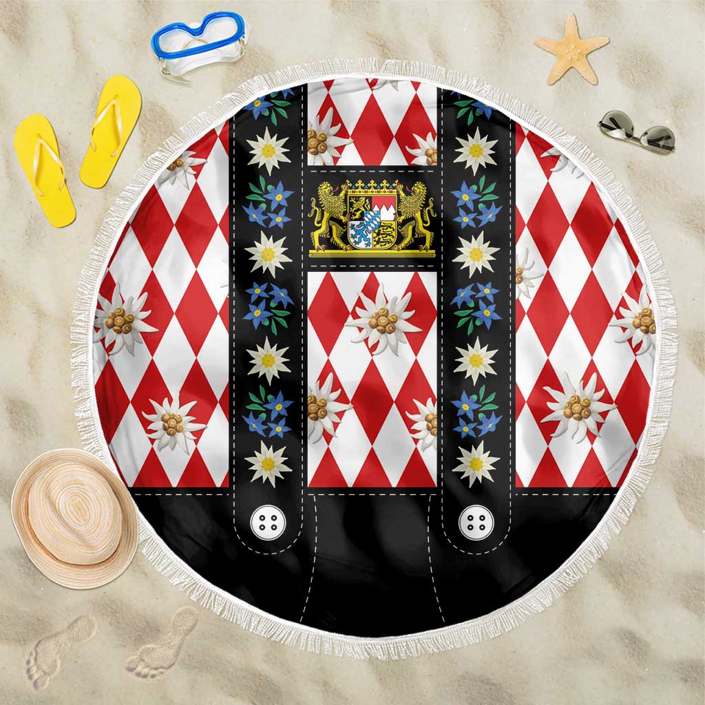 Round beach blanket with red-and-white diamond pattern, floral motifs, crest, black panels