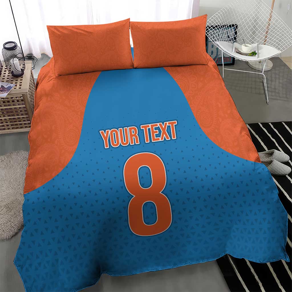 Blue and orange bedding set: duvet front shows 'Your Text' and a large 8, with pillowcases