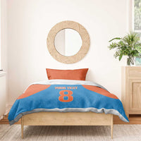 Blue and orange bedding set: duvet shows 'Your Text' and number 8, with matching pillowcases