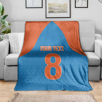 Blue and orange custom blanket with large number 8 and 'YOUR TEXT' center print