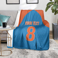 Blue and orange custom blanket with large number 0 and 'YOUR TEXT' center print