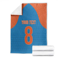 Blue and orange custom blanket with large number 8 and 'YOUR TEXT' center print