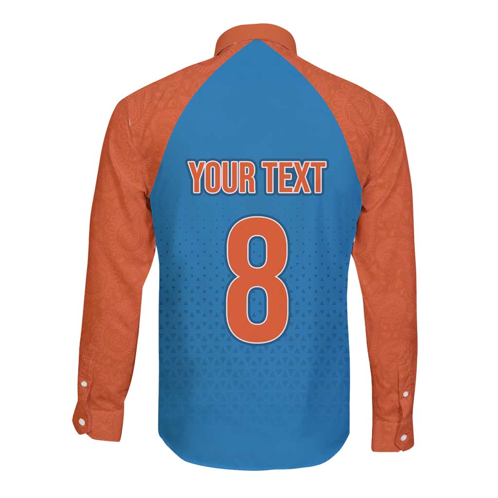 Long sleeve button shirt with blue back, orange sleeves, paisley pattern; number 8 on back