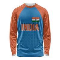 Long-sleeve raglan cricket shirt: blue body, orange sleeves, India logo front graphic