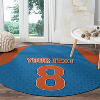 Round blue patterned carpet with orange border, large number 8 and 'YOUR TEXT'