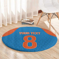 Round blue patterned carpet with orange edge, large number 8 and 'YOUR TEXT'
