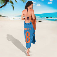 Back view custom sarong in blue and orange with 'YOUR TEXT' and large number 8