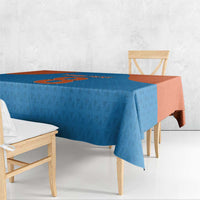 Blue patterned tablecloth with orange center panel, shown in a side view