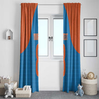 Window curtain panels in blue with rust orange top sections and custom text over number graphic