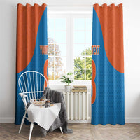 Blue and rust orange grommet-top curtain panels with custom text and large number-style design