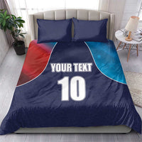 Blue and red flag-style cricket bedding set with YOUR TEXT, number 10, and two pillows