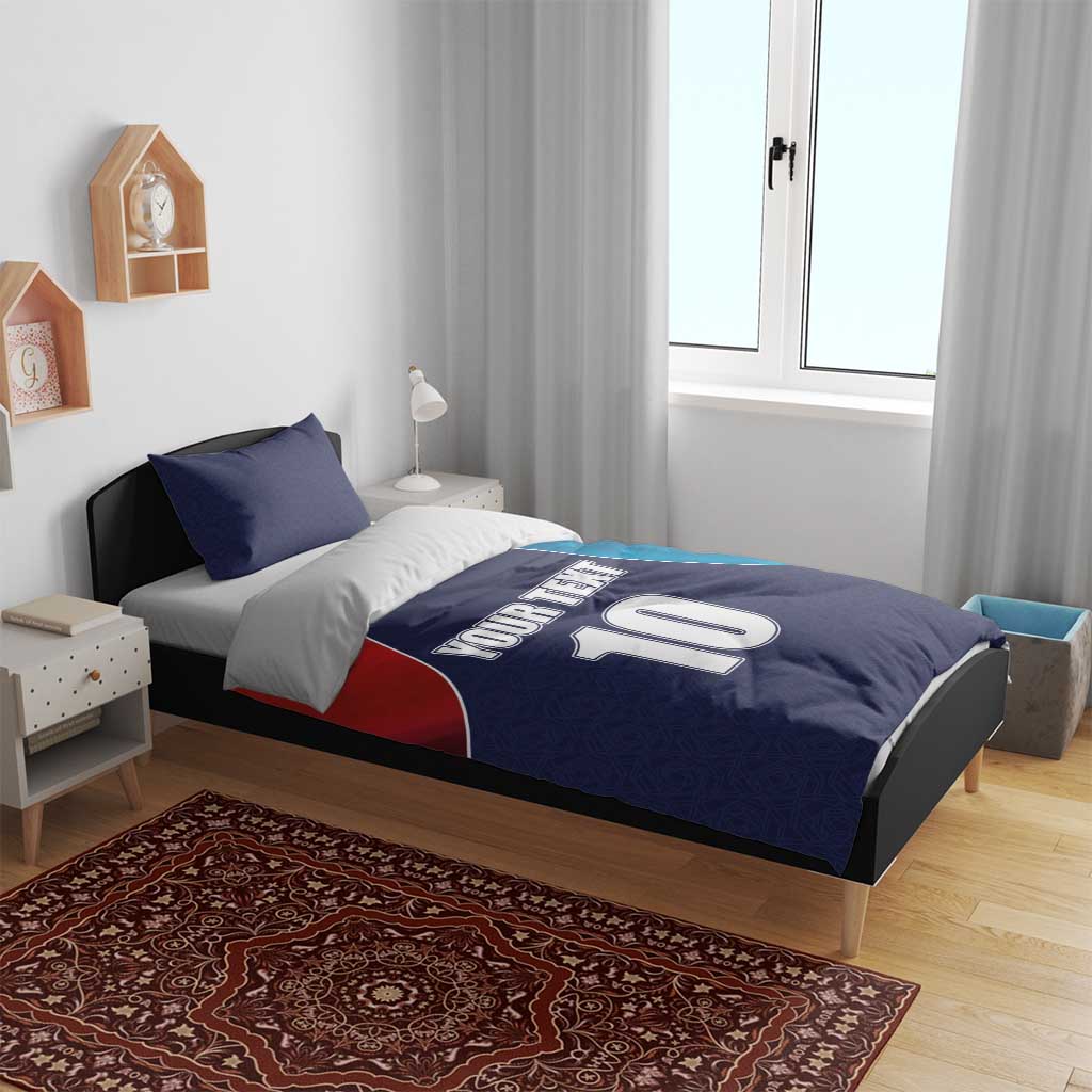 Blue and red flag-style cricket bedding set with YOUR TEXT, number 10, and two pillows