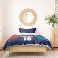 Blue and red cricket bedding set with flag design, YOUR TEXT, number 10, and two pillows