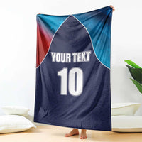 Navy blue personalized USA-style cricket blanket with flag colors, “YOUR TEXT” and number 10, draped