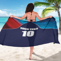 USA flag-style cricket sarong with navy, teal star accents and red panel, custom text '10' back