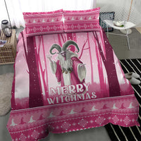 Pink Christmas witch bedding set featuring a gray witch figure and “Merry Witchmas” text