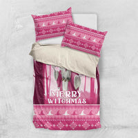 Pink Christmas witch bedding set with “Merry Witchmas” on duvet and three coordinating pillows