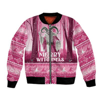 Unisex pink bomber jacket with witch graphic, 'Merry Witchmas' print, full-zip, black rib trim.