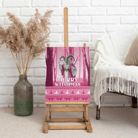 Pink canvas wall art with gray witch illustration, “Merry Witchmas,” and ornament pattern
