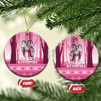 Pink round ceramic witch ornament with loop and “Merry Witchmas” front print