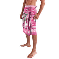 Pink knee-length lavalava with witch couple graphic and Merry Witchmas text