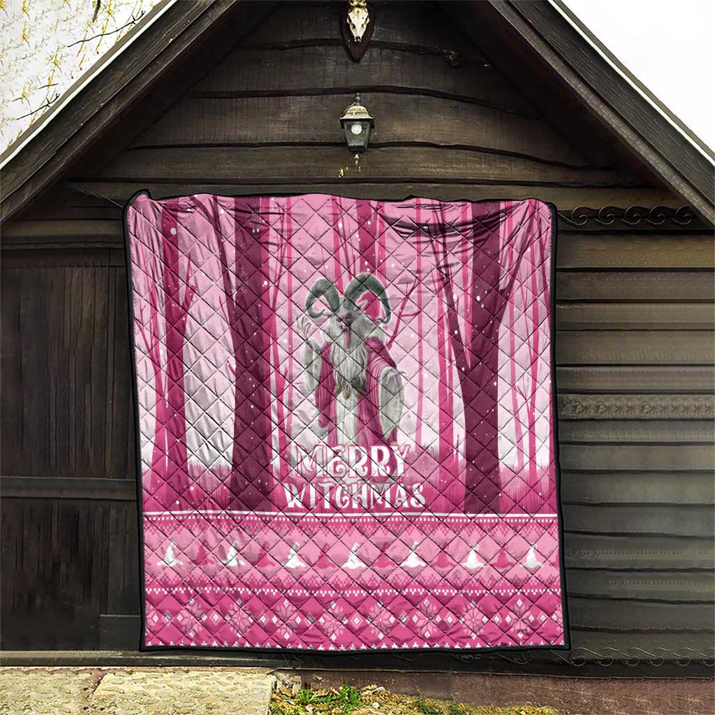 Pink quilt hanging on a wall with gray witch figure and “Merry Witchmas”