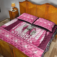 Pink quilt bed set with witch graphic and “Merry Witchmas” text, paired with two pillows