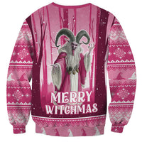 Pink unisex sweatshirt, back view, with Merry Witchmas text and witch graphic
