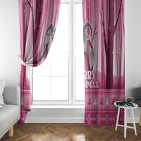 Pink witch window curtain with tie-back and “Merry Witchmas” lettering near the right panel