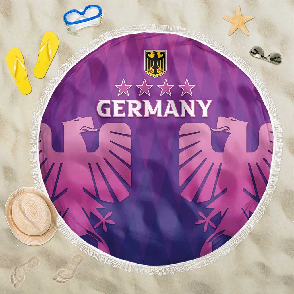 Round Germany football beach blanket in purple-pink with fringed edge and emblem