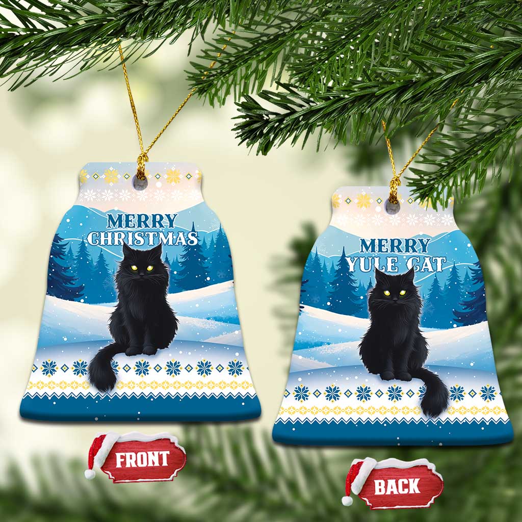 Blue round and bell-shaped ceramic cat ornaments with “Merry Christmas” and “Yule Cat” text