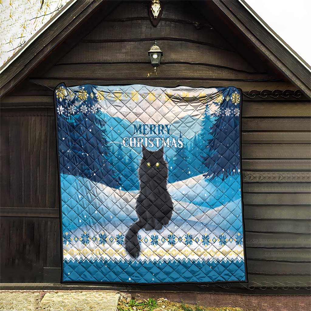 Blue quilt displayed with black cat, snow trees, and “Merry Christmas” text