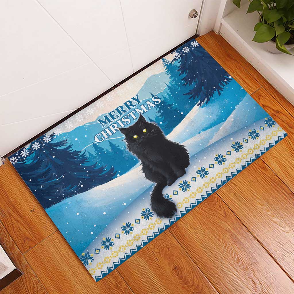 Blue rubber doormat with black cat and Merry Christmas over snow scene, blue border trim