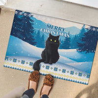 Blue rubber doormat with black cat, Merry Christmas message, snowy trees and geometric border