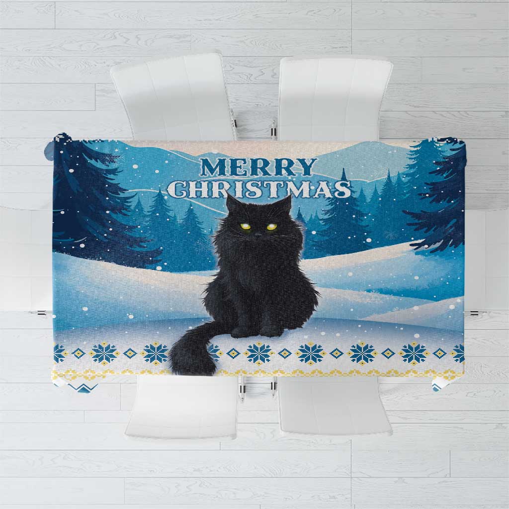 Blue Christmas tablecloth with black cat illustration, snowy trees, and Nordic border