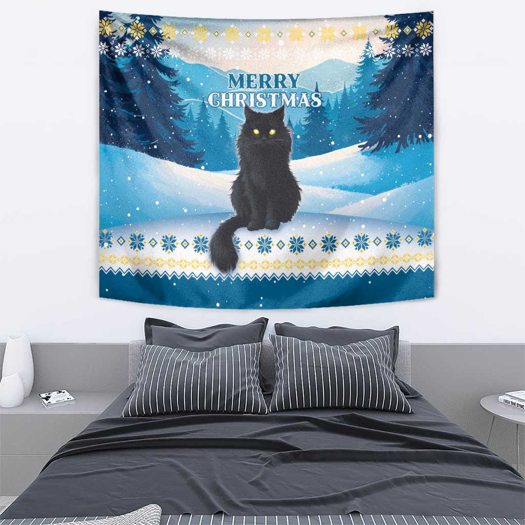 Blue winter tapestry showing a black cat above snow with “Merry Christmas” headline